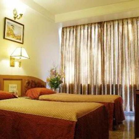 Hotel Mandakini Ambience Pune Habitación foto