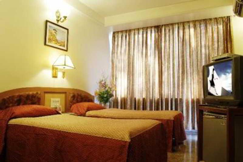 Hotel Mandakini Ambience Pune Habitación foto