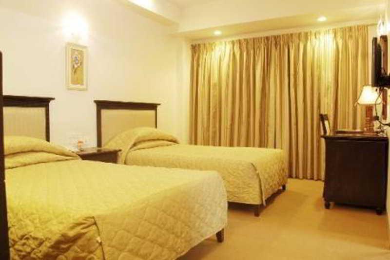 Hotel Mandakini Ambience Pune Habitación foto